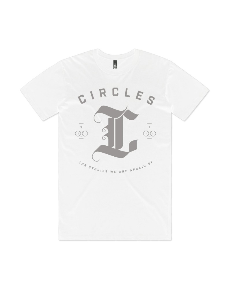 Circles "THE STORIES WE ARE AFRAID OF | VOL.1 - WHITE EMBLEM T-SHIRT" T-Shirt $12.25 Shirts